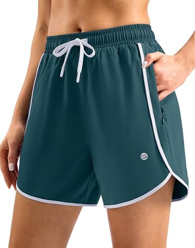 Women's 5" swim shorts, zip pockets, deep green