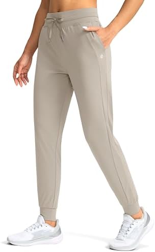 Women's tapered joggers, zip pockets, pale